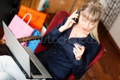 stock photo: woman shopping online via internet from home-Raw Stock Photo ID: 39288