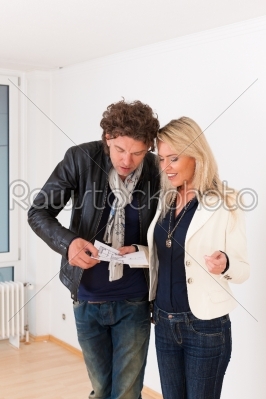 stock photo: young couple looking for real estate-Raw Stock Photo ID: 43396