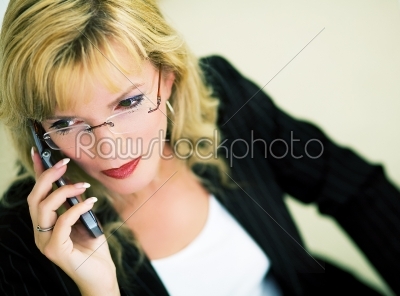 stock photo: businesswoman with cellphone-Raw Stock Photo ID: 51432