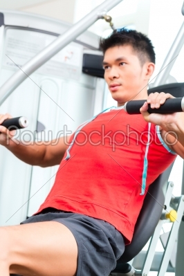 stock photo: chinese man training strength in fitness gym-Raw Stock Photo ID: 49519
