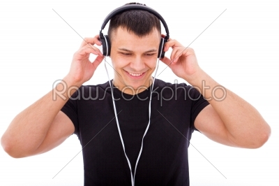 stock photo: handsome boy listening to music with headphones-Raw Stock Photo ID: 53329