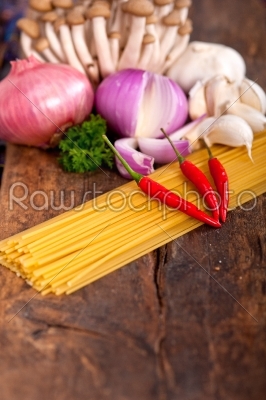 stock photo: italian pasta and mushroom sauce ingredients-Raw Stock Photo ID: 64004