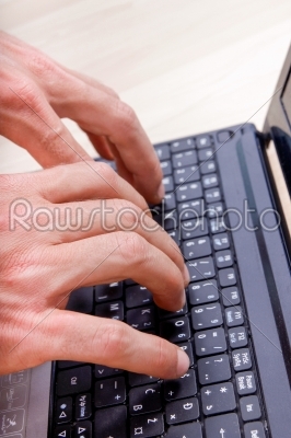 stock photo: mans hands typing on laptop keyboard-Raw Stock Photo ID: 53888