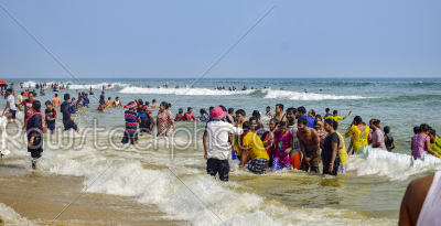 stock photo: people enjoying beach life of puri beach in eastern india a holy-Raw Stock Photo ID: 75328