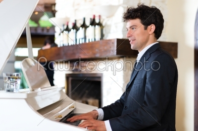 stock photo: pianist in a fine restaurant-Raw Stock Photo ID: 48544