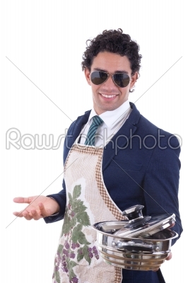 adult man with an apron holding a cooking pot