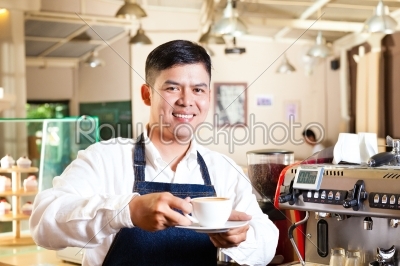 Asian Coffeeshop - barista presents coffee