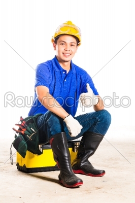 Asian construction  worker with tools