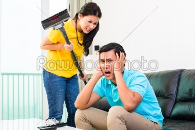 Asian couple having relationship difficulties