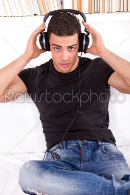 attractive handsome man with headphones