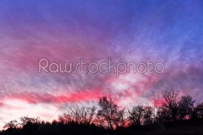 Beautiful sunset / sunrise with blood red clouds in blue sky