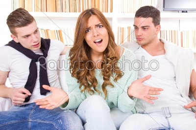 beautiful woman hasitates between two young men