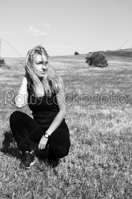 beautiful young woman in the countryside field