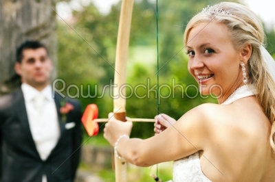 Bride shooting herself a Groom