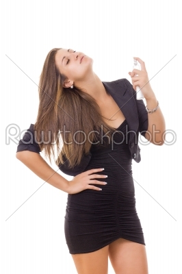 business woman sprayed perfume on the neck