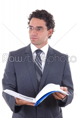 Businessman holding an open notebook