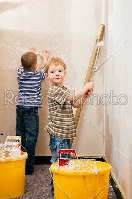 children painting wall