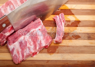 chopping fresh pork ribs 