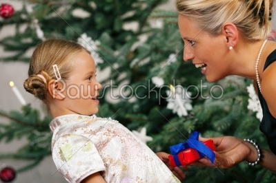Christmas - child receiving a gift