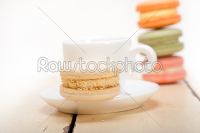 colorful macaroons with espresso coffee 