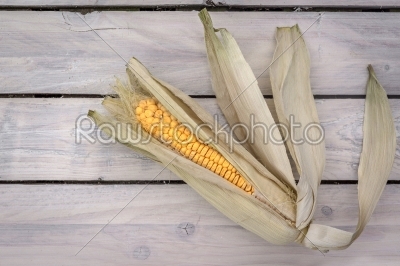Corn on wooden planks