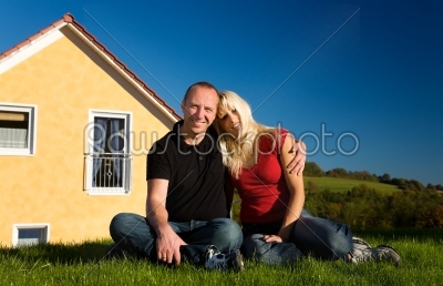 Couple and their country house
