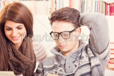 couple at home reading books
