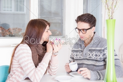 couple drinking coffee together at home