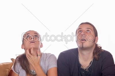 couple looking up in surprise
