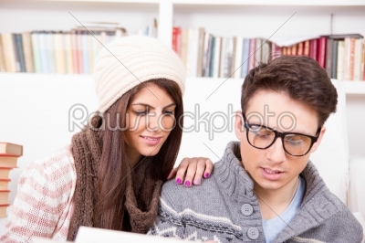 couple reading a book together