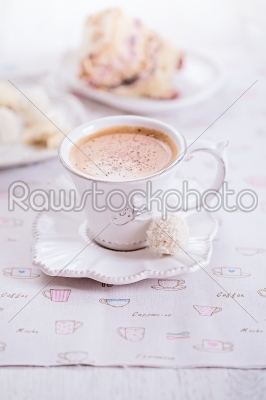 Cup of coffee with  sweets