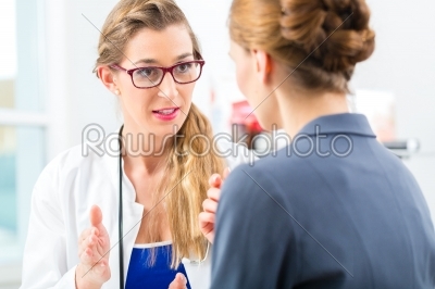 Doctor with patient in a consulting