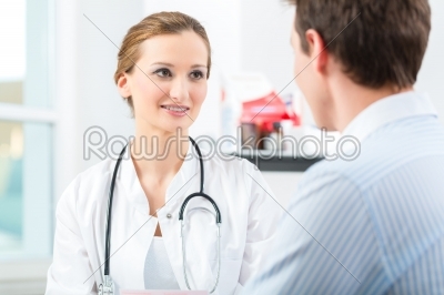 Doctor with patient in clinic consulting 