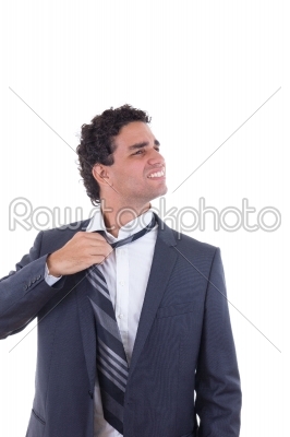 exhausted businessman removing tie