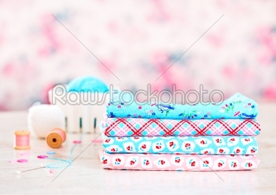 Fabric Pile of colorful folded textile with sew items