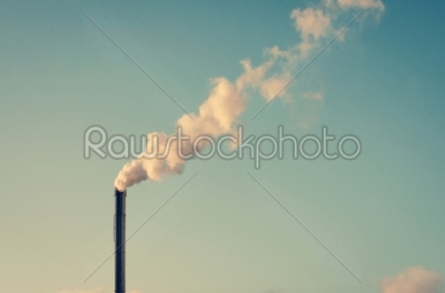 Factory with smoking chimney