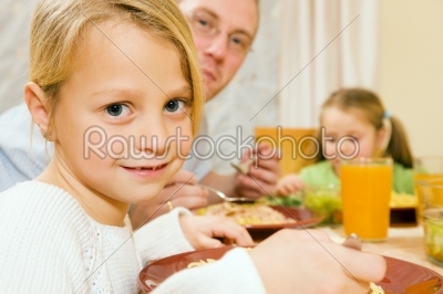 Family having a meal together