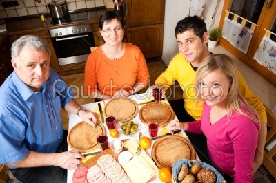 Family having hearty dinner