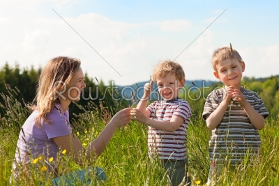 Family summer - playing on the meadow