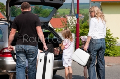 Family travelling by car 