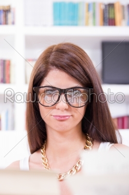 female geek student with glasses