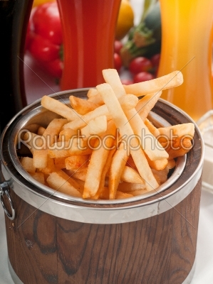 fresh french fries on a bucket
