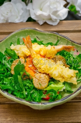 fresh Japanese tempura shrimps with salad