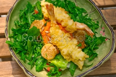fresh Japanese tempura shrimps with salad