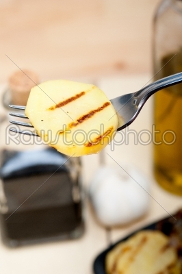 grilled potato on a fork