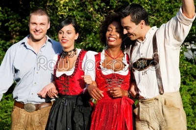 Group of four friends in Bavarian Tracht