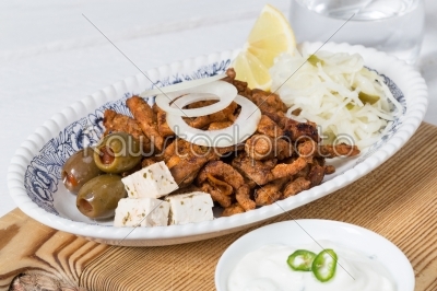 Gyros with Tzatziki Coleslaw olives and feta cheese