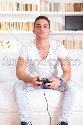 handsome guy playing video game