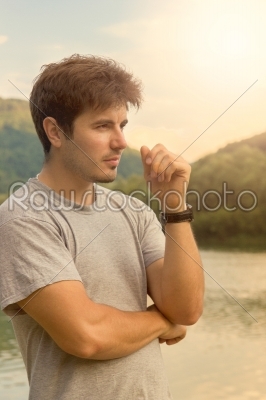 handsome man at the lake