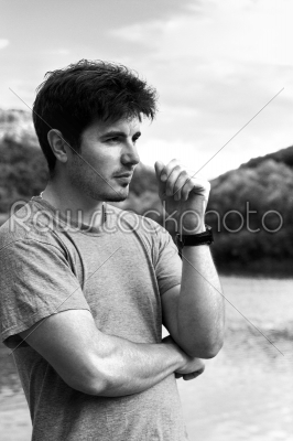 handsome man on summer vacation relaxing at the lake